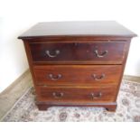 Edwardian mahogany inlaid chest of three drawers on raised bracket feet (84cm x 53cm x 82cm)