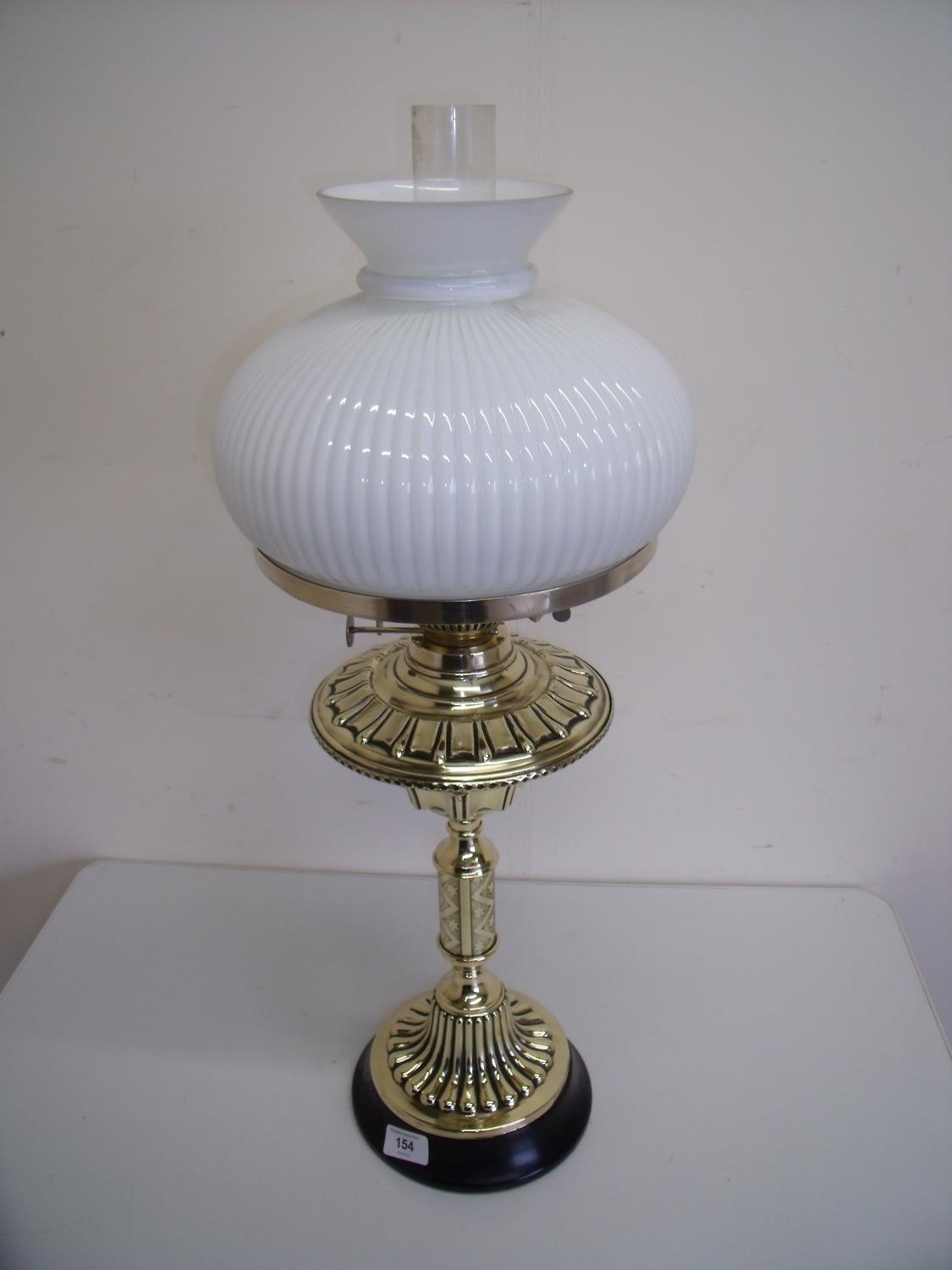 19th/20th C Arts & Crafts style brass oil lamp with opaque glass shade (68cm high)