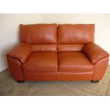 Large two seat leather sofa and matching smaller two seat sofa