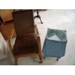 1930s oak framed Lloyd Loom style easy chair and a Lloyd loom laundry basket (2)