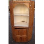 19th C waxed pine floor standing corner cupboard with two tier open top with painted interior