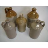 Collection of five Stoneware flagons including T. Bailey Grocer Aarby and Harry Holgate Leeds