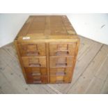 Edwardian golden oak eight drawer filing type desk top cabinet (37cm x 51cm x 42cm)