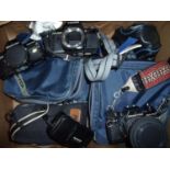 Selection of various cameras and camera equipment including Praktica BC1 Electronic, various lenses,