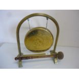 Early 20th C brass dinner gong on stand with (36cm high)