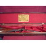 Cased William Rochester Pape 14 bore percussion single barrelled bar action sporting gun no. 541,
