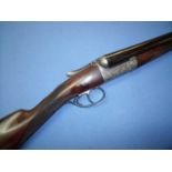 John Dickson & Son 12 bore side by side round action shotgun with 27 inch barrels, 2 1/2 inch