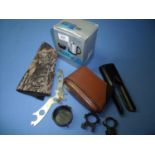 Selection of miscellaneous gun related items including leather forend cover, leather butt pad,