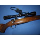 Ruger M77II .22-250 bolt action rifle fitted with a Burnis 6xFull Field scope, serial no. 780-