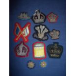 Collection of various assorted embroidered and cloth badges and insignia including various crowns,