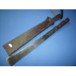 1944 machete with 14 inch square blade stamped NN44 with two piece wooden grip and leather sheath