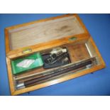 Wooden cased shotgun cleaning kit