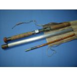 Three-piece vintage split cane rod with additional piece and steel rod case with canvas outer case