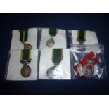 Group of Territorial miniature medals including Territorial Force Nurse Service, GR V Officers, GR