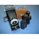 Cased vintage Kodak camera and a pair of No CT0VIST II 8x30 binoculars (2)