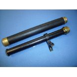 Vintage black painted and brass gun sight/scope and a single drawer telescope by Thomas J Evans