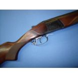 Baikal 12 over & under ejector shotgun with 27 1/4 inch barrels and 14 1/4 inch pistol grip stock,