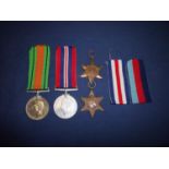 Group of four WWII medals comprising of 39-45 Star, France & Germany Star, War & Defence Medals (4)