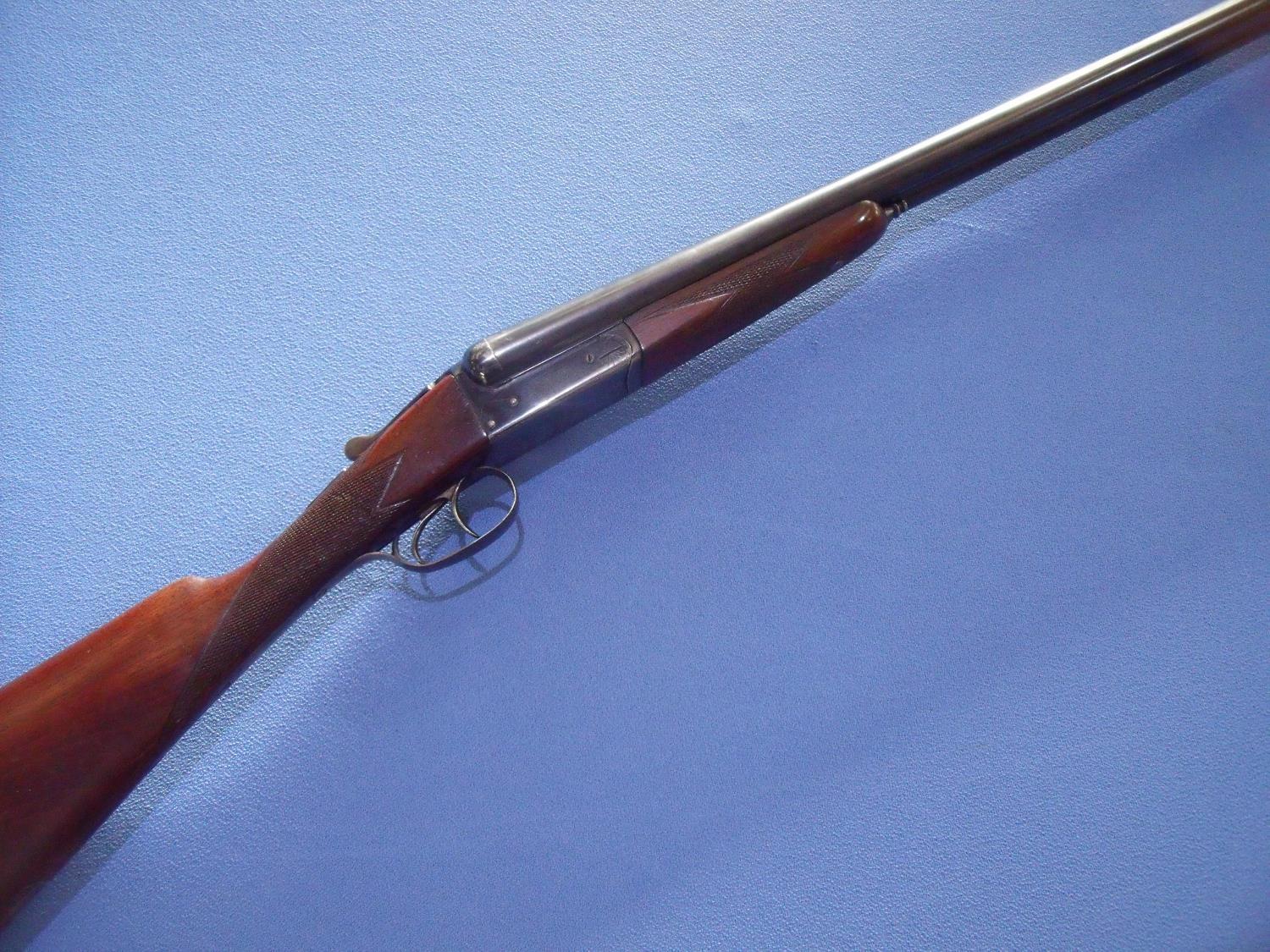 Modern Arms Co 12 bore side by side ejector shotgun with 28 inch barrels and 14 inch stock, serial