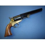 Blank firing Colt style long barrelled revolver with brass framework and two piece wooden grip