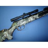 Kral .22 break barrel air rifle with composite woodland camouflage stock, mounted with 4x20 scope