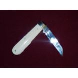 Sheffield made folding pocket knife with 3 inch blade and two piece ivory grips with working back