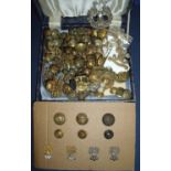 Selection of various military buttons, cap badges, shoulder titles etc for various regiments