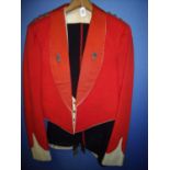 Officer's mess kit with scarlet jacket with white cuffs and edging and white waist coat with XX
