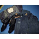 RAF holdall with a selection of uniform including peaked cap with badges, jacket, boots etc