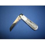 Sheffield made pocket knife with 2 1/2 inch blade and two piece antler grips