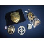 Selection of WWII German related badges including relic state combat badge & lapel badge and
