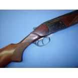 Baikal 12 bore over & under ejector shotgun with 27 1/2 inch barrels, choke 1/2 & 1/4 with 14 1/4