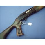 Remmington 1100 12 bore semi auto five shot shotgun with 27 inch barrel, synthetic stock and