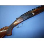 Case 12 bore Remington 3200 over & under special trap gun, with raised vented 30 inch barrels and 14