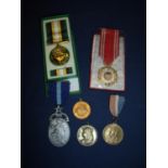 Boxed ECOMOG Medal for Libya, various commemorative medals including a George V Queen Mary