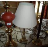 Group of three assorted brass and other table lamps