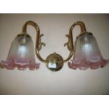 Seven brass twin branch wall light fittings