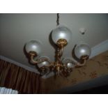 Pair of five branch brass centre hanging chandeliers