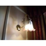 Eight single branch brass wall light fittings