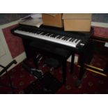 Yamaha Clavinova electric piano with piano sttol, music stand etc