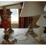 Gilt and onyx stepped base table lamp, a onyx lamp and two others (4)