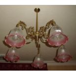 Pair of brass five branch centre light fittings with shades