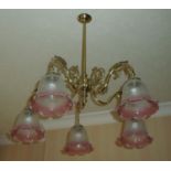 Pair of brass five branch centre light fittings with shades