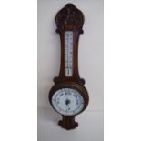 Early 20th C carved oak framed wall barometer