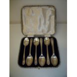 Cased set of six silver hallmarked golfing teaspoons and for matching teaspoons (10)