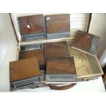 Vintage suitcase containing a selection of railway related items including various printing blocks