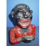 19th/20th C cast metal hand to mouth penny money bank (17cm high) named panel to back 'Jolly******