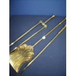 Quality Victorian brass three piece fire companion set comprising of shell pattern shovel, tongs and