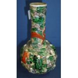An unusual Japanese bottle neck vase with pierce detail decorated with multiple figures and
