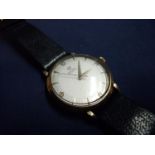 9ct gold cased Omega automatic (1012) gents wristwatch with black leather strap, number on plate